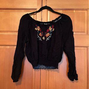 H&M black blouse with flower pattern
